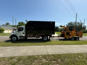 KTS chip truck towing a chipper