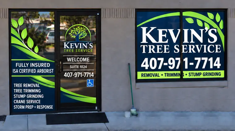 Kevin's Tree Service storefront in Oviedo, Florida, with company signage on the windows and the entrance